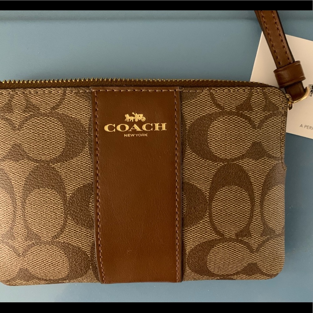 Coach wristlet, never used.